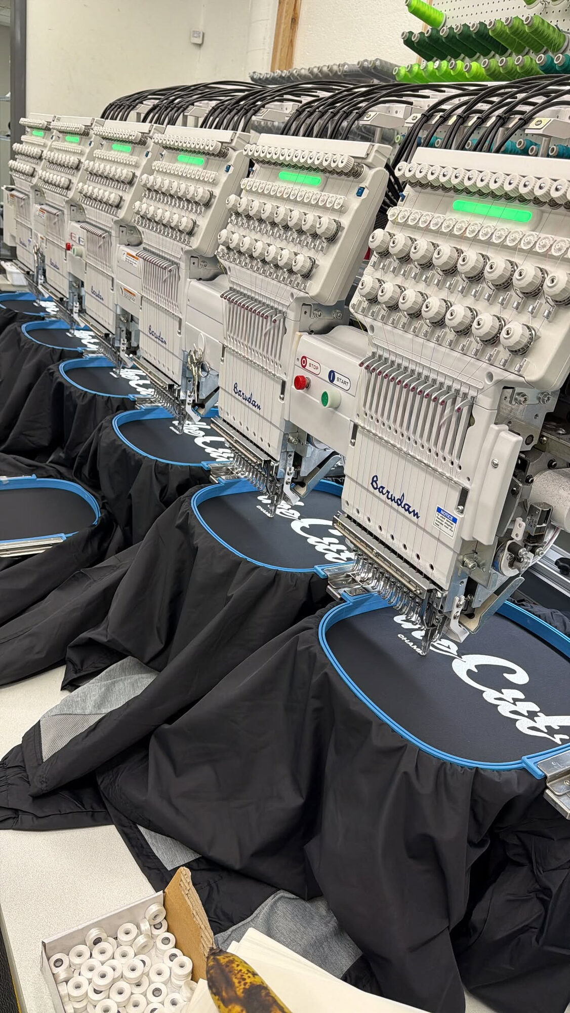 Multi-head embroidery production line